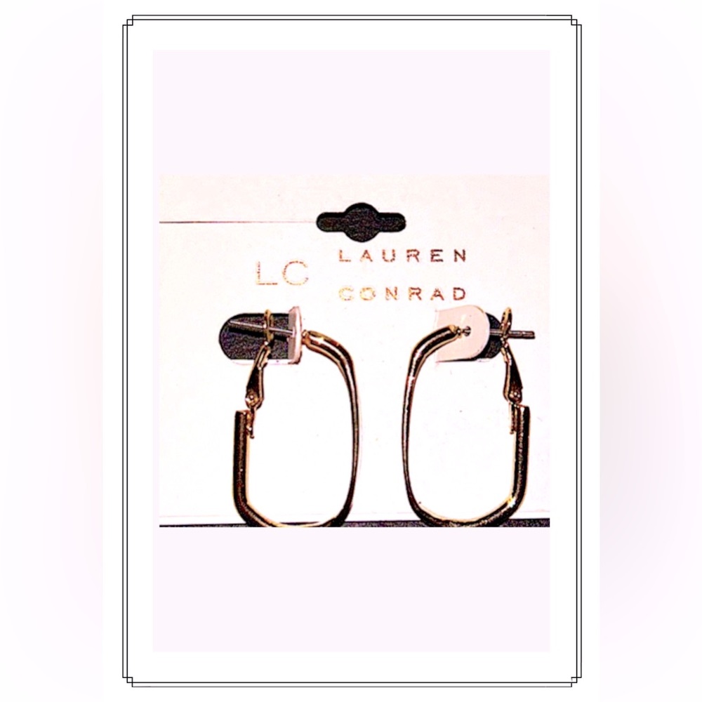LC Lauren Conrad gold tone Leverback oval hoop earrings.